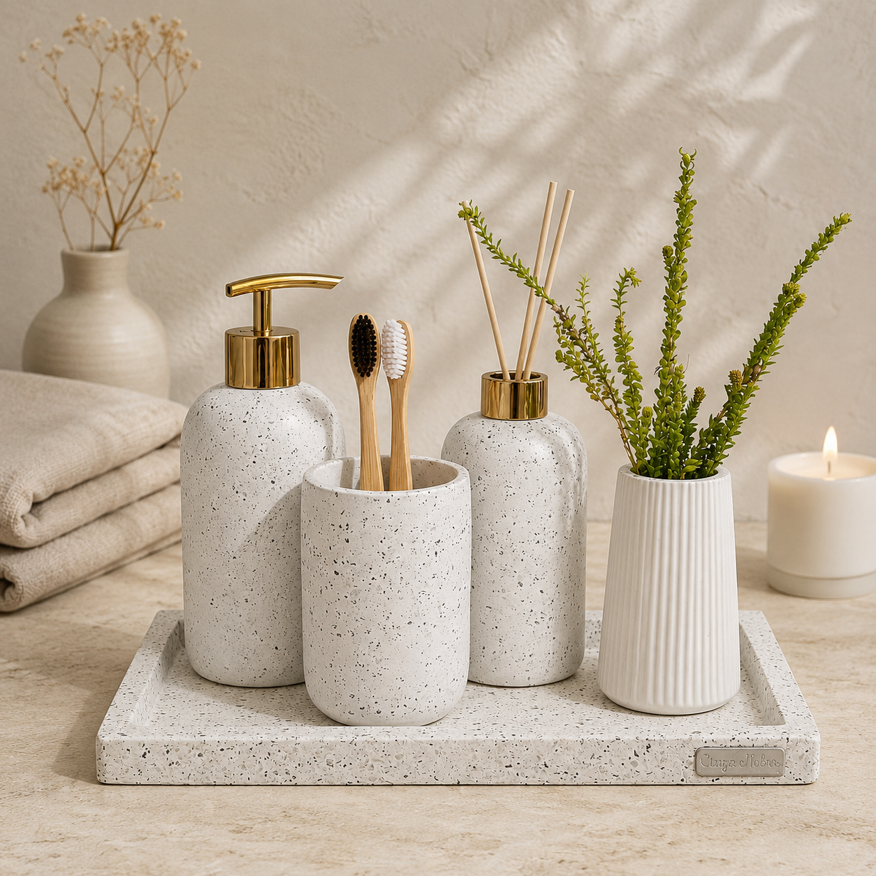 Composição editorial de kit artesanal em cimento com bandeja, dispenser, porta-escovas, difusor e vaso decorativo.
